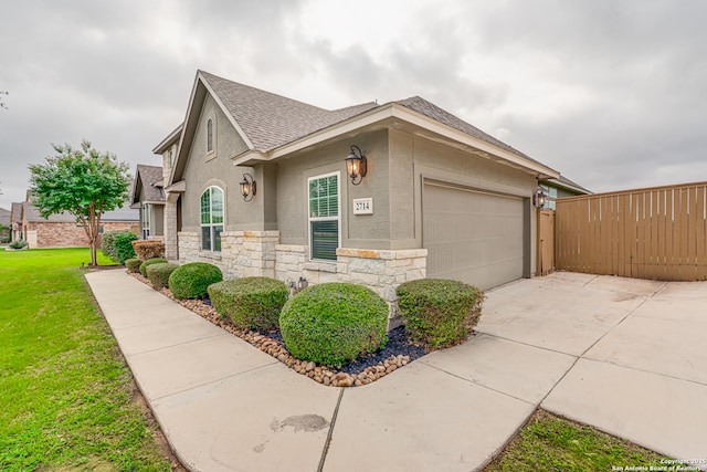 2714 Trailmont Dr, San Antonio, TX 78253 - view of front of property featuring stone siding, roof with shingles, stucco siding, concrete driveway, and an attached garage