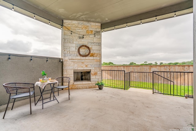 2714 Trailmont Dr, San Antonio, TX 78253 - view of patio / terrace with an outdoor stone fireplace