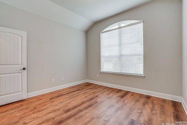 2714 Trailmont Dr, San Antonio, TX 78253 - unfurnished room featuring vaulted ceiling, wood finished floors, and baseboards