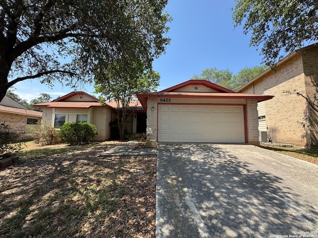 8423 Timber, San Antonio, TX 78250 - ranch-style house with brick siding, concrete driveway, and an attached garage