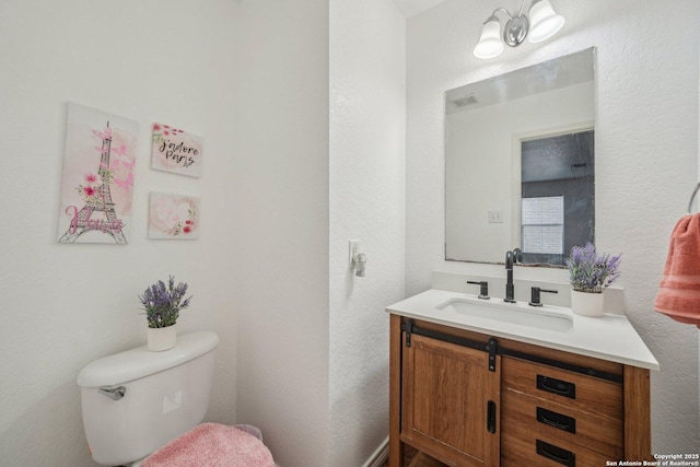 5815 Trent, San Antonio, TX 78249 - half bathroom with toilet, vanity, and a textured wall
