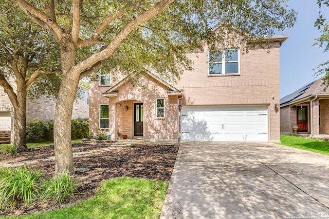 20827 Foothill Pne, San Antonio, TX 78259 - traditional-style home with a garage, brick siding, and driveway