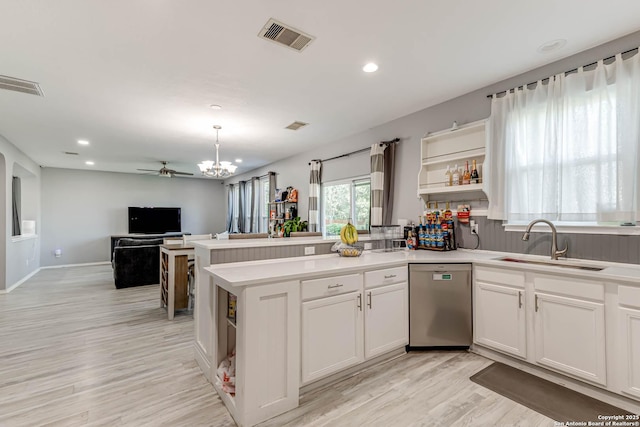 20827 Foothill Pne, San Antonio, TX 78259 - kitchen with dishwasher, open shelves, a sink, a peninsula, and open floor plan