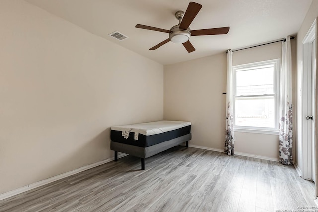 20827 Foothill Pne, San Antonio, TX 78259 - bedroom with light wood finished floors, ceiling fan, and baseboards