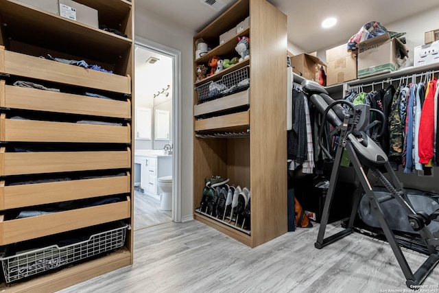 20827 Foothill Pne, San Antonio, TX 78259 - spacious closet with wood finished floors