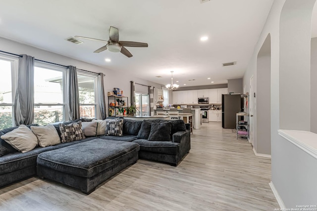 20827 Foothill Pne, San Antonio, TX 78259 - living area with a ceiling fan, a chandelier, light wood-style floors, recessed lighting, and baseboards