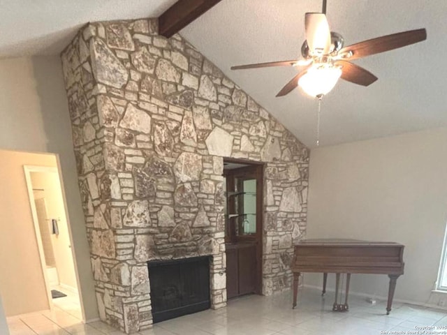 8526 Timberwilde, San Antonio, TX 78250 - unfurnished living room with ceiling fan, beam ceiling, a fireplace, high vaulted ceiling, and tile patterned floors