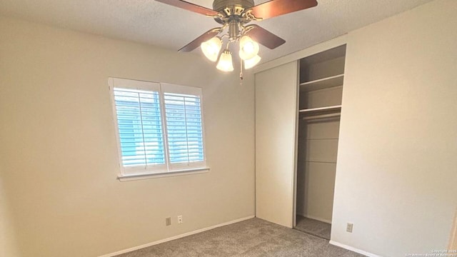 8526 Timberwilde, San Antonio, TX 78250 - unfurnished bedroom with carpet floors, a closet, baseboards, and ceiling fan