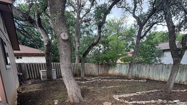 8526 Timberwilde, San Antonio, TX 78250 - fenced backyard with central air condition unit