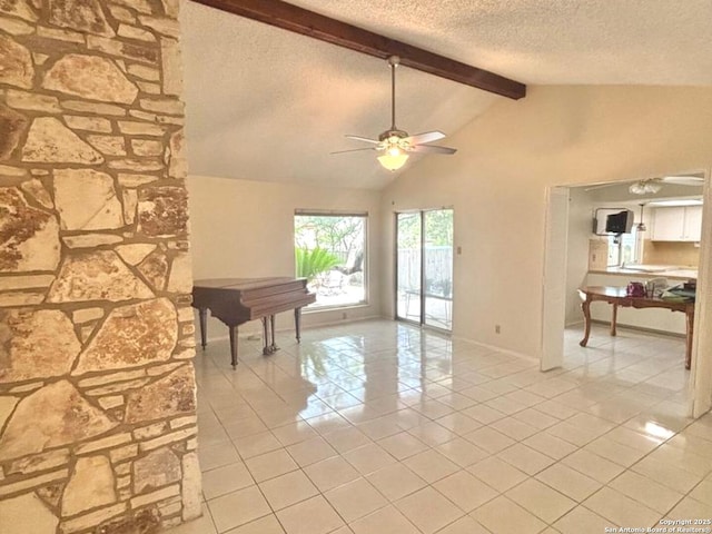 8526 Timberwilde, San Antonio, TX 78250 - unfurnished living room with a textured ceiling, a ceiling fan, and light tile patterned flooring