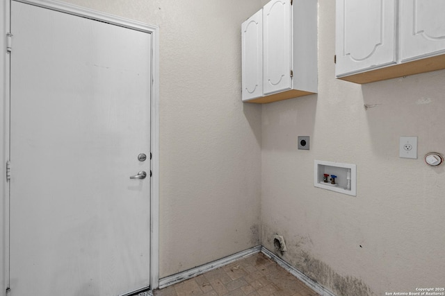 4635 Branching Bay, San Antonio, TX 78259 - laundry room with electric dryer hookup, cabinet space, and washer hookup