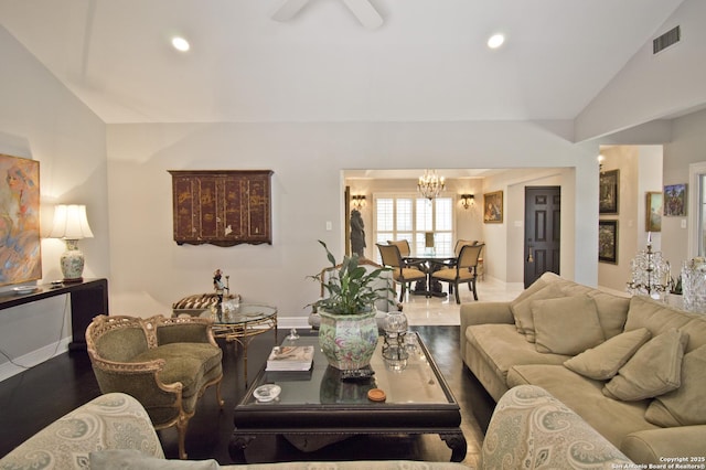 8 Kensington Ct, San Antonio, TX 78218 - living area featuring lofted ceiling, a chandelier, wood finished floors, baseboards, and recessed lighting