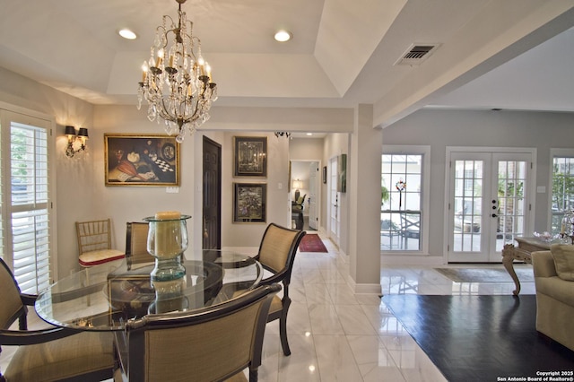 8 Kensington Ct, San Antonio, TX 78218 - dining area with a chandelier, a tray ceiling, baseboards, recessed lighting, and french doors