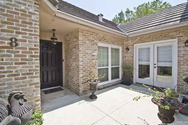 8 Kensington Ct, San Antonio, TX 78218 - property entrance featuring french doors and brick siding