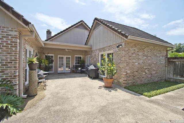 8 Kensington Ct, San Antonio, TX 78218 - rear view of house with french doors, brick siding, a patio area, a ceiling fan, and board and batten siding