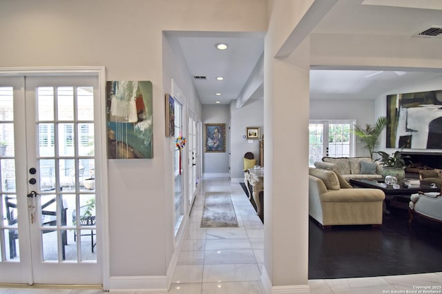 8 Kensington Ct, San Antonio, TX 78218 - corridor featuring french doors, baseboards, recessed lighting, and light marble finish floors