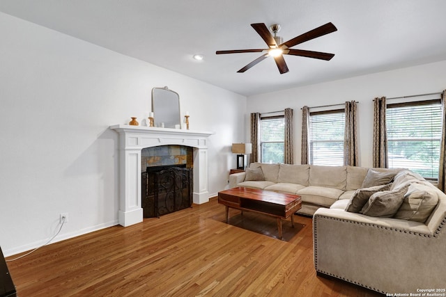 4451 Taylors Bnd, San Antonio, TX 78247 - living area featuring a ceiling fan, light wood-style flooring, a tile fireplace, and recessed lighting