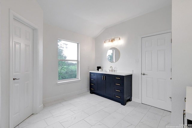 4451 Taylors Bnd, San Antonio, TX 78247 - bathroom with vanity, marble finish floors, and lofted ceiling
