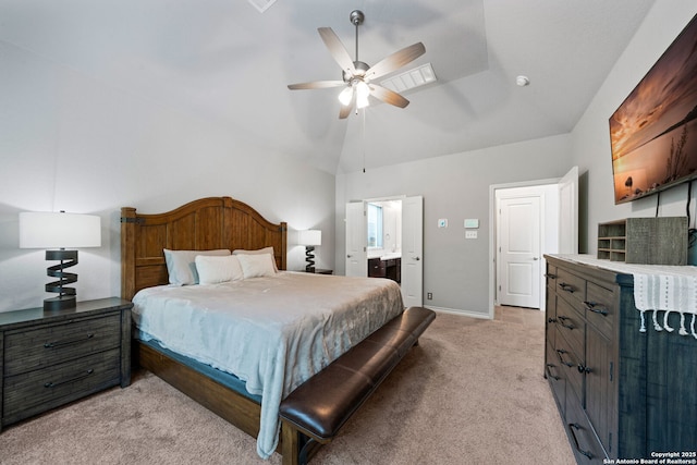 9706 Kremmen, Boerne, TX 78006 - bedroom featuring light carpet, lofted ceiling, ensuite bathroom, baseboards, and a ceiling fan