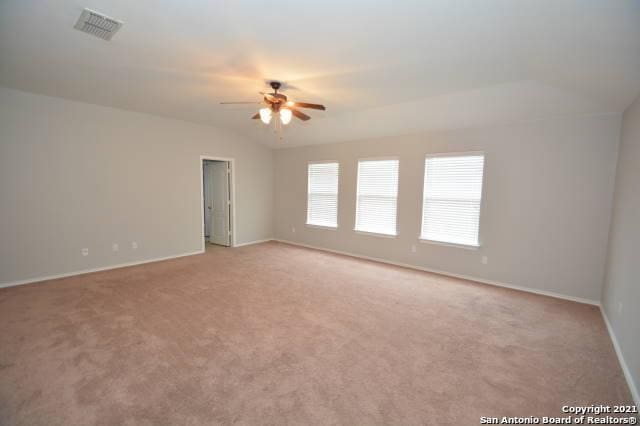 807 Maltese Gdn, San Antonio, TX 78260 - spare room with ceiling fan, baseboards, light carpet, and lofted ceiling