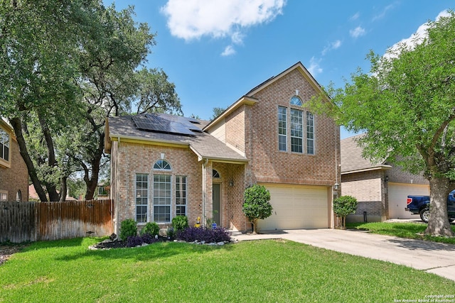 11823 Stanton, San Antonio, TX 78253 - traditional home with brick siding, solar panels, concrete driveway, an attached garage, and roof with shingles