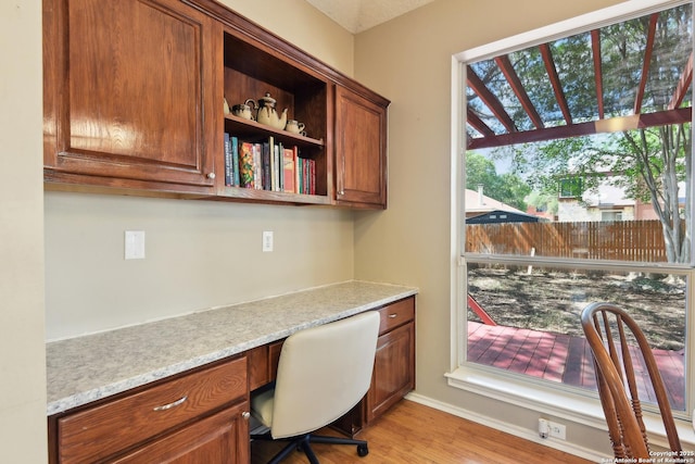 11823 Stanton, San Antonio, TX 78253 - unfurnished office featuring built in study area, light wood-style floors, and baseboards