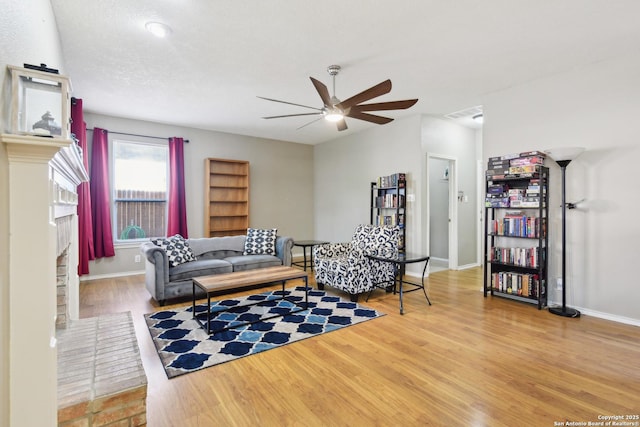 11823 Stanton, San Antonio, TX 78253 - sitting room with a ceiling fan, wood finished floors, and baseboards