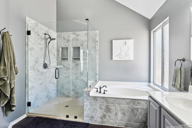 11823 Stanton, San Antonio, TX 78253 - full bath featuring a bath, a stall shower, vanity, and vaulted ceiling