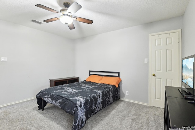 11823 Stanton, San Antonio, TX 78253 - carpeted bedroom with baseboards, a textured ceiling, and a ceiling fan