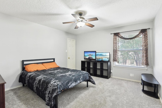 11823 Stanton, San Antonio, TX 78253 - carpeted bedroom featuring a textured ceiling, baseboards, and a ceiling fan