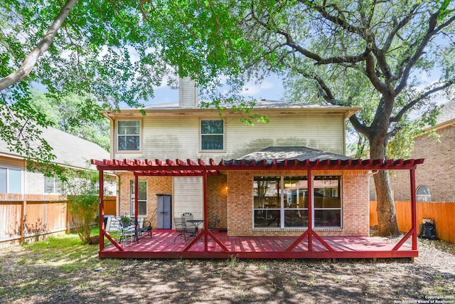 11823 Stanton, San Antonio, TX 78253 - back of property featuring a fenced backyard, a pergola, a deck, and brick siding