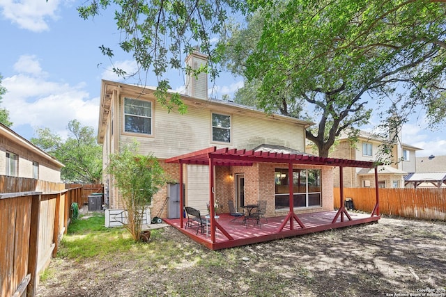 11823 Stanton, San Antonio, TX 78253 - rear view of property with a pergola, a fenced backyard, a wooden deck, brick siding, and cooling unit