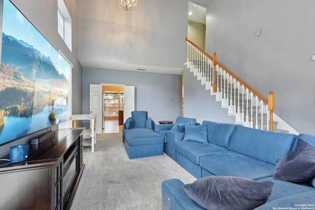 11823 Stanton, San Antonio, TX 78253 - carpeted living area with a towering ceiling, healthy amount of natural light, and stairs