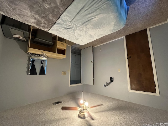 309 Royal, Converse, TX 78109 - empty room featuring a textured ceiling and ceiling fan