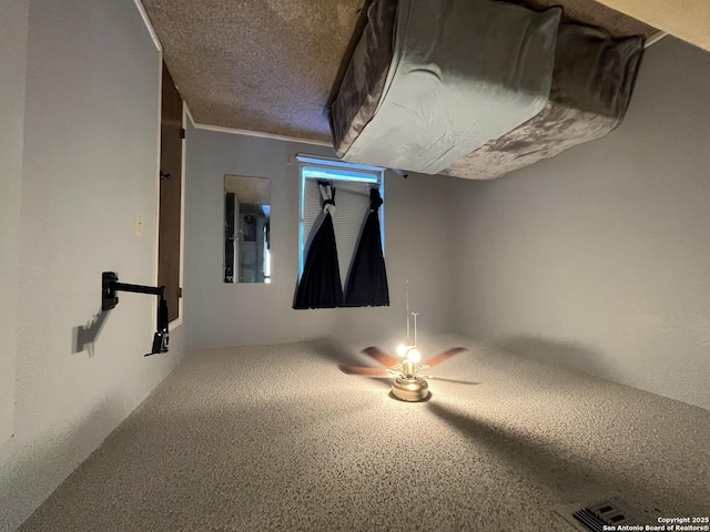 309 Royal, Converse, TX 78109 - unfurnished bedroom with a textured ceiling and ceiling fan