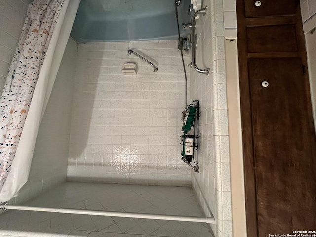 309 Royal, Converse, TX 78109 - bathroom featuring a shower and tile patterned flooring