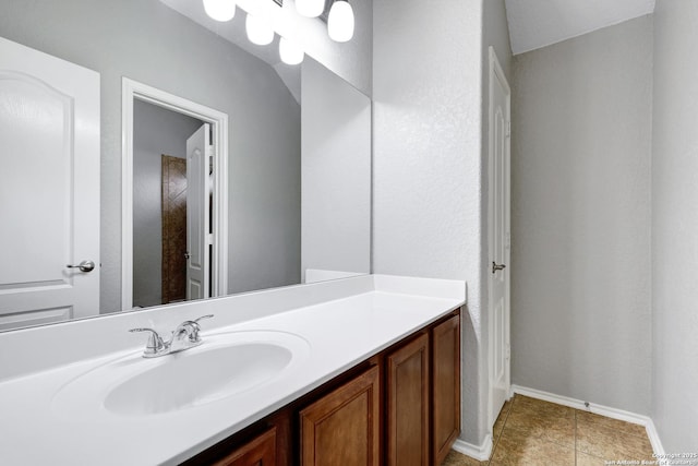 25511 Willard Path, San Antonio, TX 78261 - bathroom with vanity, baseboards, and tile patterned floors