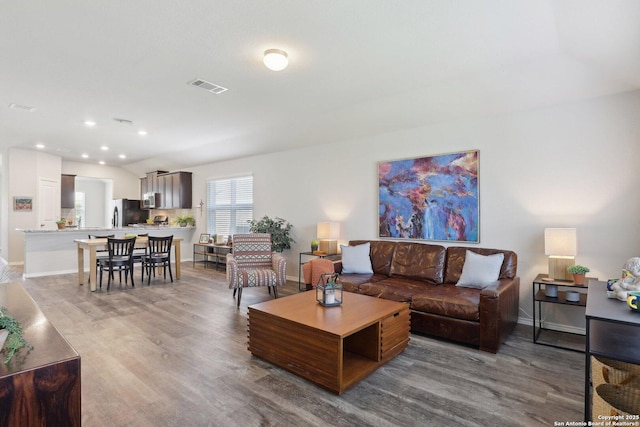 6131 Akin, San Antonio, TX 78261 - living room with light wood-style floors, baseboards, and recessed lighting