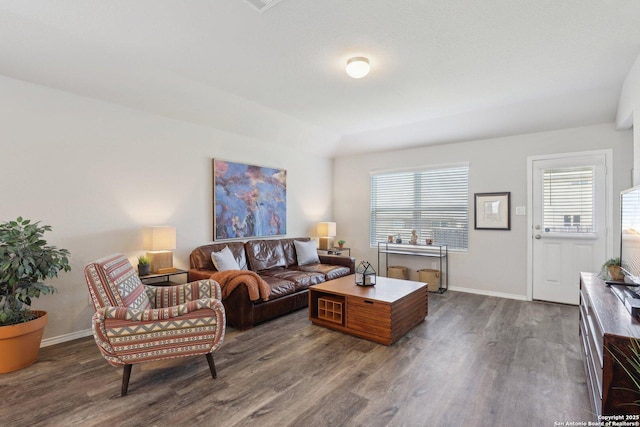 6131 Akin, San Antonio, TX 78261 - living area featuring dark wood finished floors, plenty of natural light, and baseboards