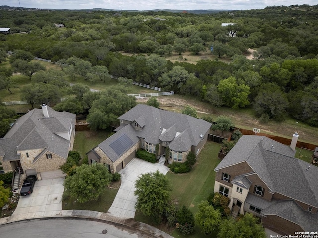 26358 Tawny Way, Boerne, TX 78015 - aerial perspective of suburban area with a heavily wooded area