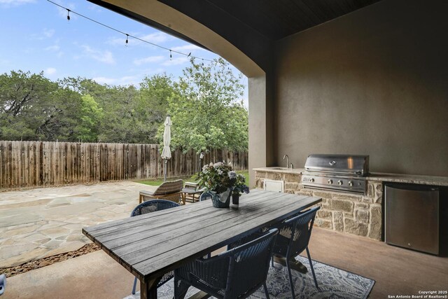 26358 Tawny Way, Boerne, TX 78015 - view of patio / terrace with outdoor dining area and a sink