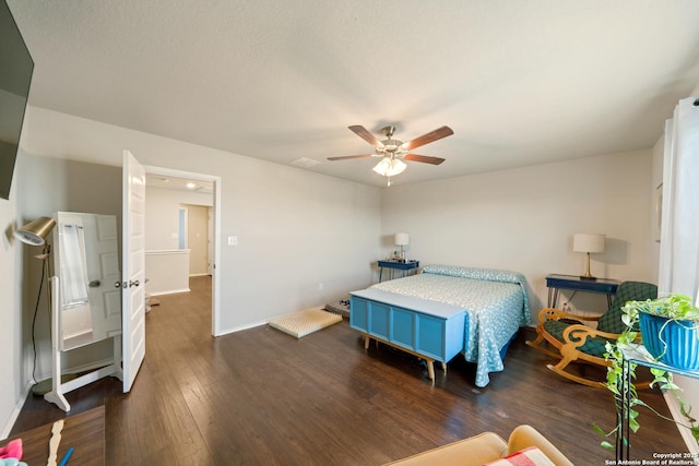 10815 Fox Trot, Converse, TX 78109 - bedroom with wood finished floors, a ceiling fan, and baseboards