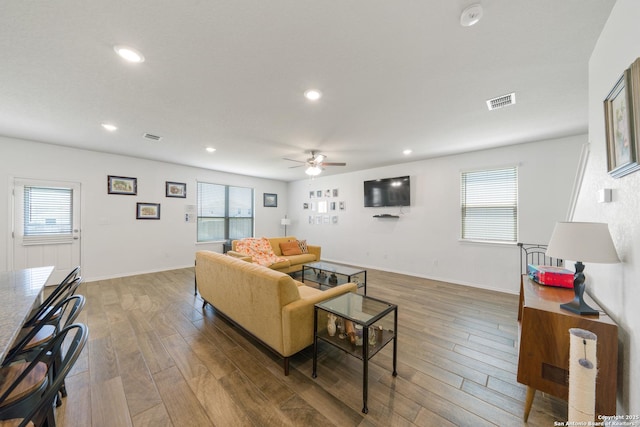 10815 Fox Trot, Converse, TX 78109 - living room featuring ceiling fan, wood finished floors, recessed lighting, and healthy amount of natural light