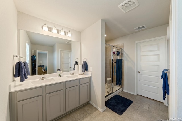 10815 Fox Trot, Converse, TX 78109 - full bathroom with a shower stall, double vanity, tile patterned flooring, and baseboards