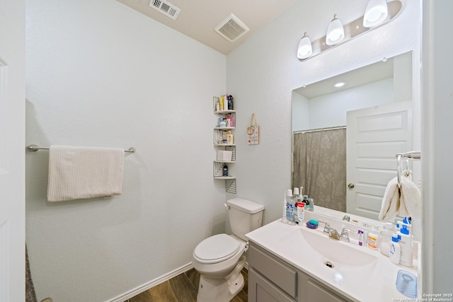 10815 Fox Trot, Converse, TX 78109 - bathroom featuring vanity, wood finished floors, toilet, and a shower with shower curtain