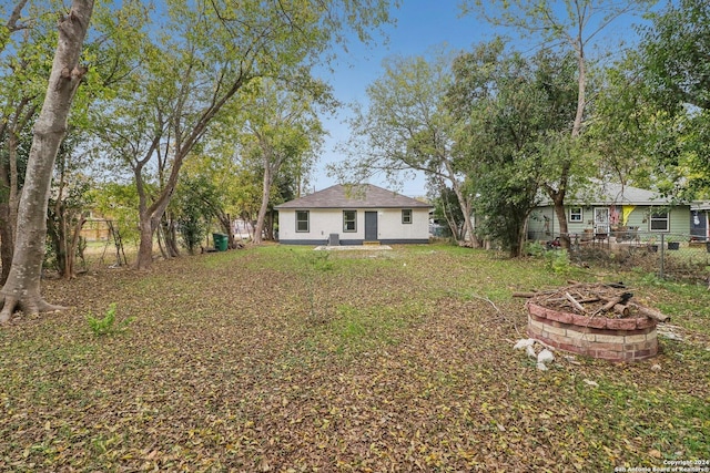 228 Quinta St, San Antonio, TX 78210 - view of yard with an outdoor fire pit