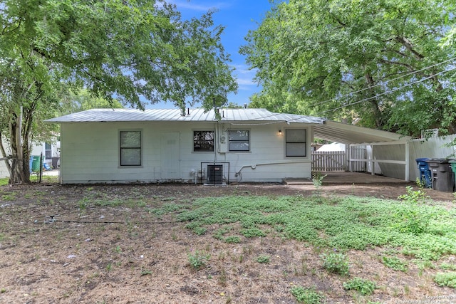143 Langford, San Antonio, TX 78221 - back of property featuring metal roof and central air condition unit