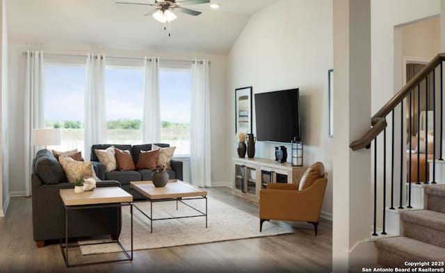 1526 Passmore Downs, New Braunfels, TX 78130 - living room featuring ceiling fan, stairs, wood finished floors, baseboards, and high vaulted ceiling