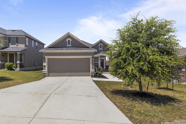 8415 Fortuna Vly, San Antonio, TX 78252 - view of front of house featuring driveway, a front yard, an attached garage, and stucco siding