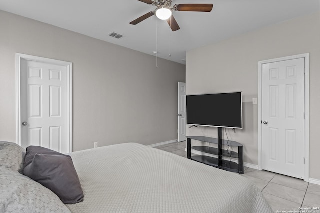 8415 Fortuna Vly, San Antonio, TX 78252 - bedroom featuring light tile patterned flooring, baseboards, and a ceiling fan